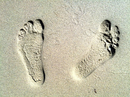 Fußabdrücke im Sand
